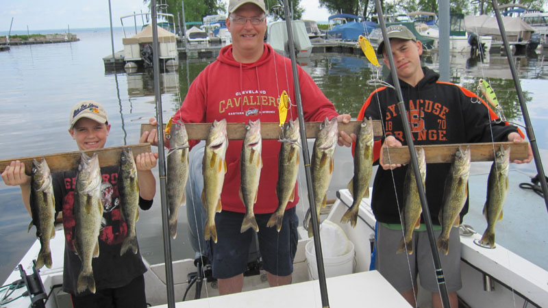 Zach, Bruce and Isaac Havens Zach, Bruce and Isaac Havens with fish caught during kids fishing charter in 2012