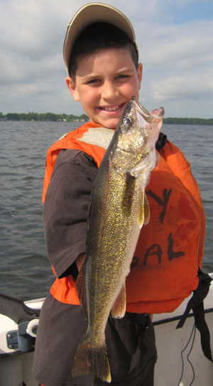 Zach Havens was the winner of the OLA Kids Fishing Charter Zach Havens featured with fish caught during kids fishing charter in 2012